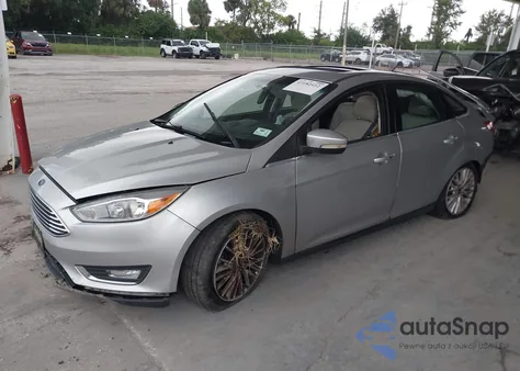 2017 Ford Focus Titanium z USA, uszkodzony, nr VIN 1FADP3J23HL291611